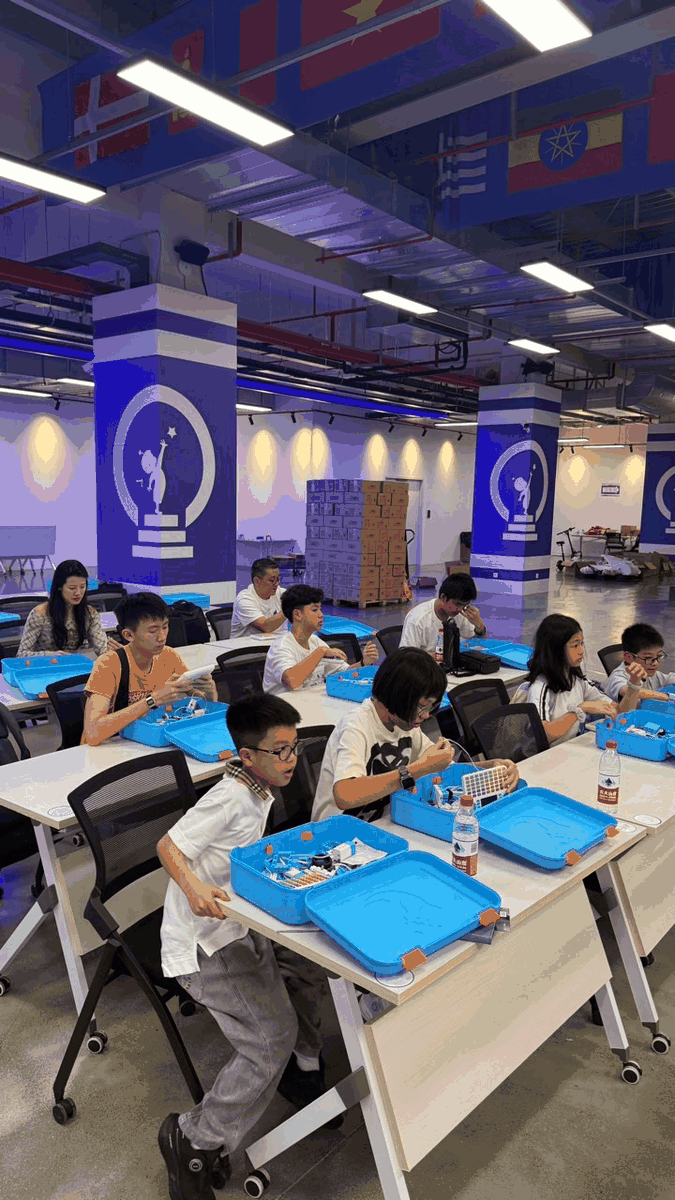 Students learning at an EnjoyAI activity