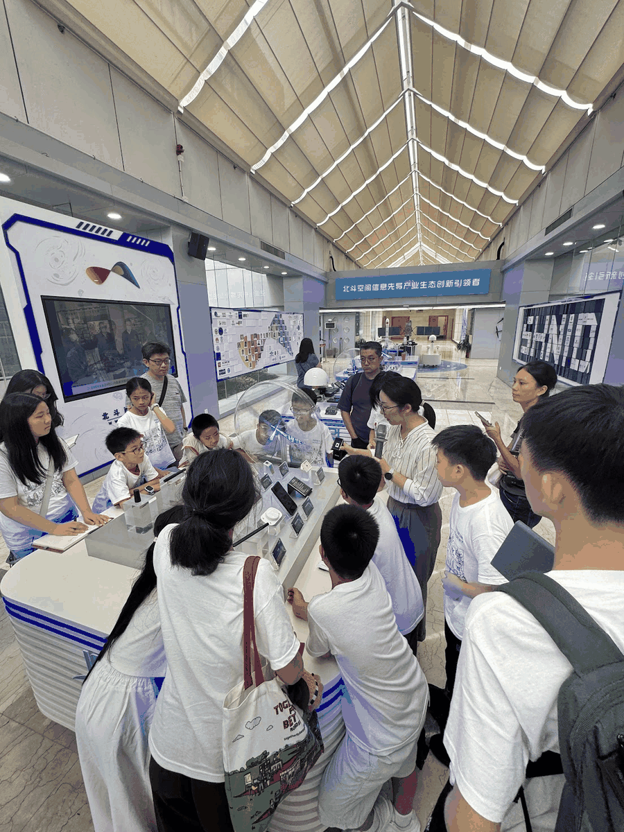 Students visiting a technology exhibition space